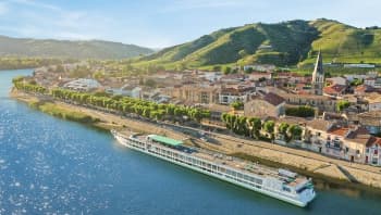 All the must-see sites on the Rhône between Lyon, Provence, and the Camargue with a dinner at Paul Bocuse's Abbaye de Collonges Restaurant OFFERED (port-to-port cruise)